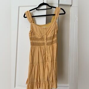 Yellow dress with lace details